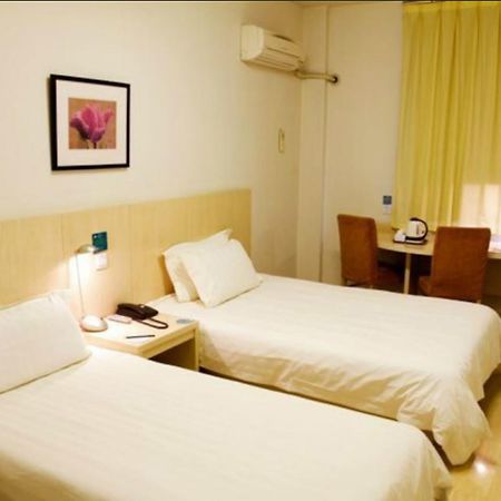 Magnolia Business Hotel Xining Railway Station Grand Cross Mojia Street Bagian luar foto