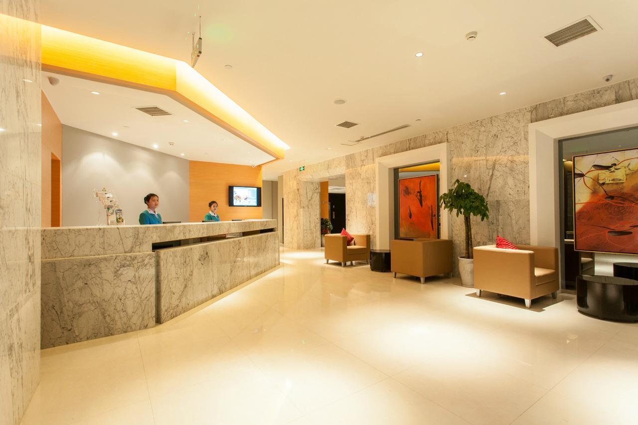 Magnolia Business Hotel Xining Railway Station Grand Cross Mojia Street Bagian luar foto