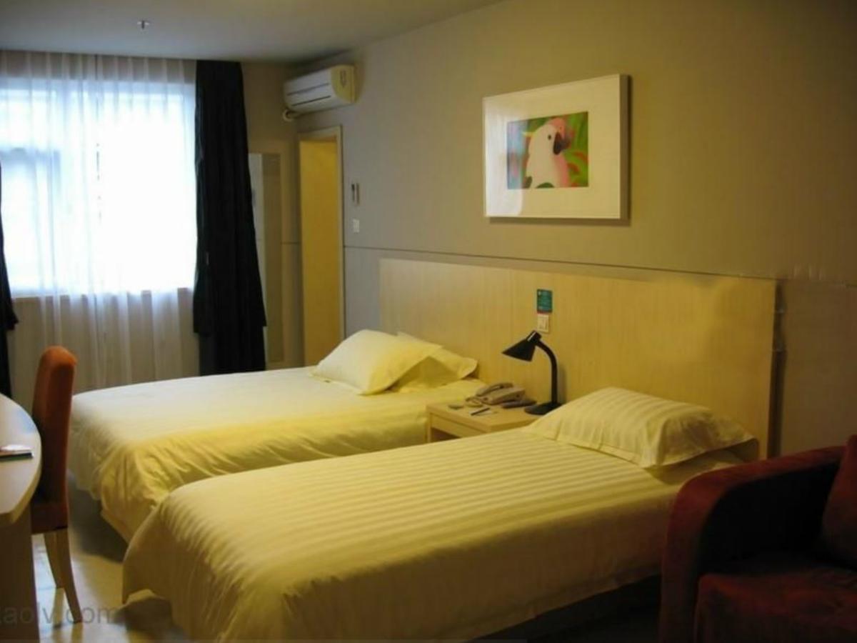 Magnolia Business Hotel Xining Railway Station Grand Cross Mojia Street Bagian luar foto