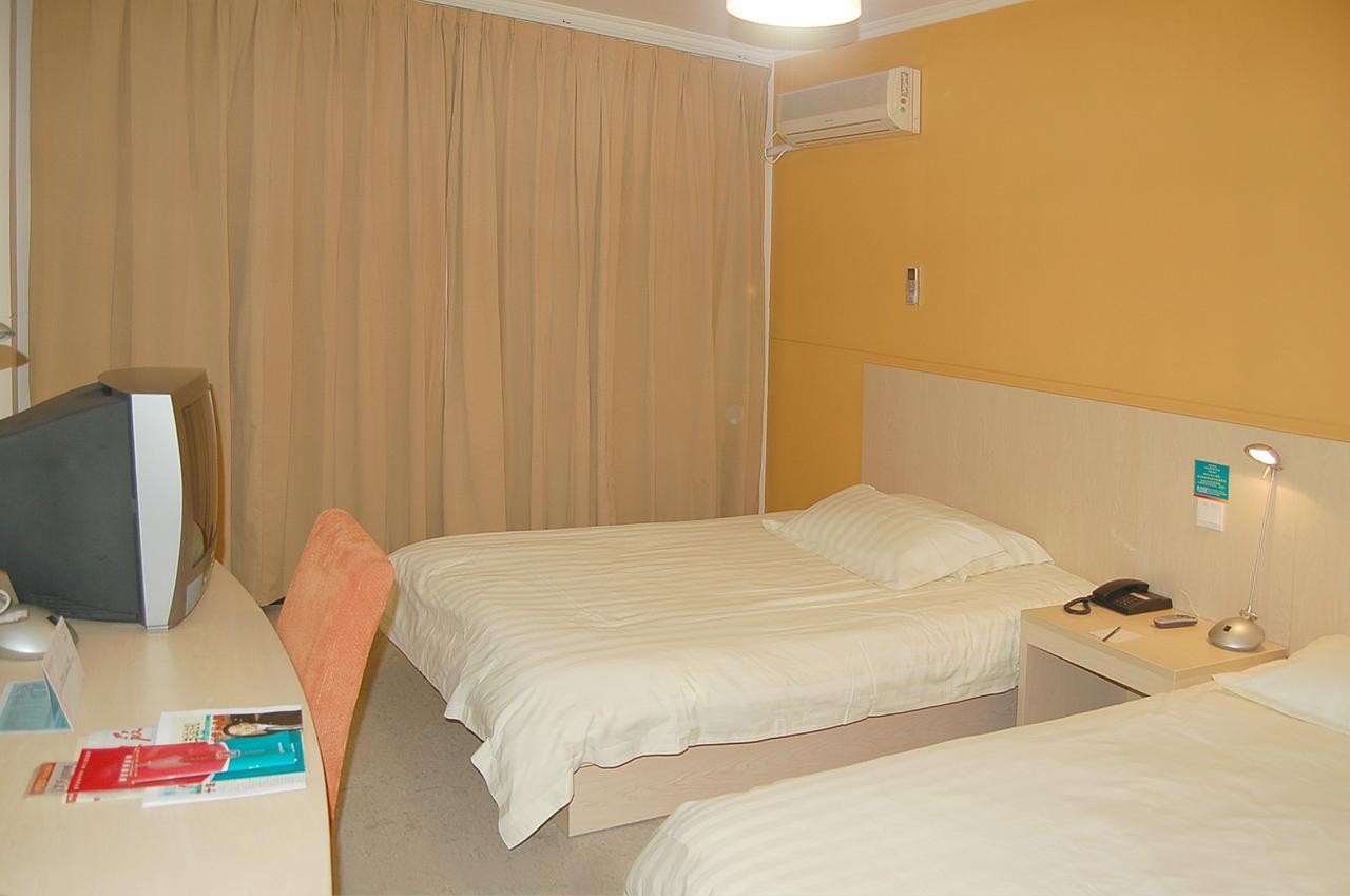 Magnolia Business Hotel Xining Railway Station Grand Cross Mojia Street Bagian luar foto
