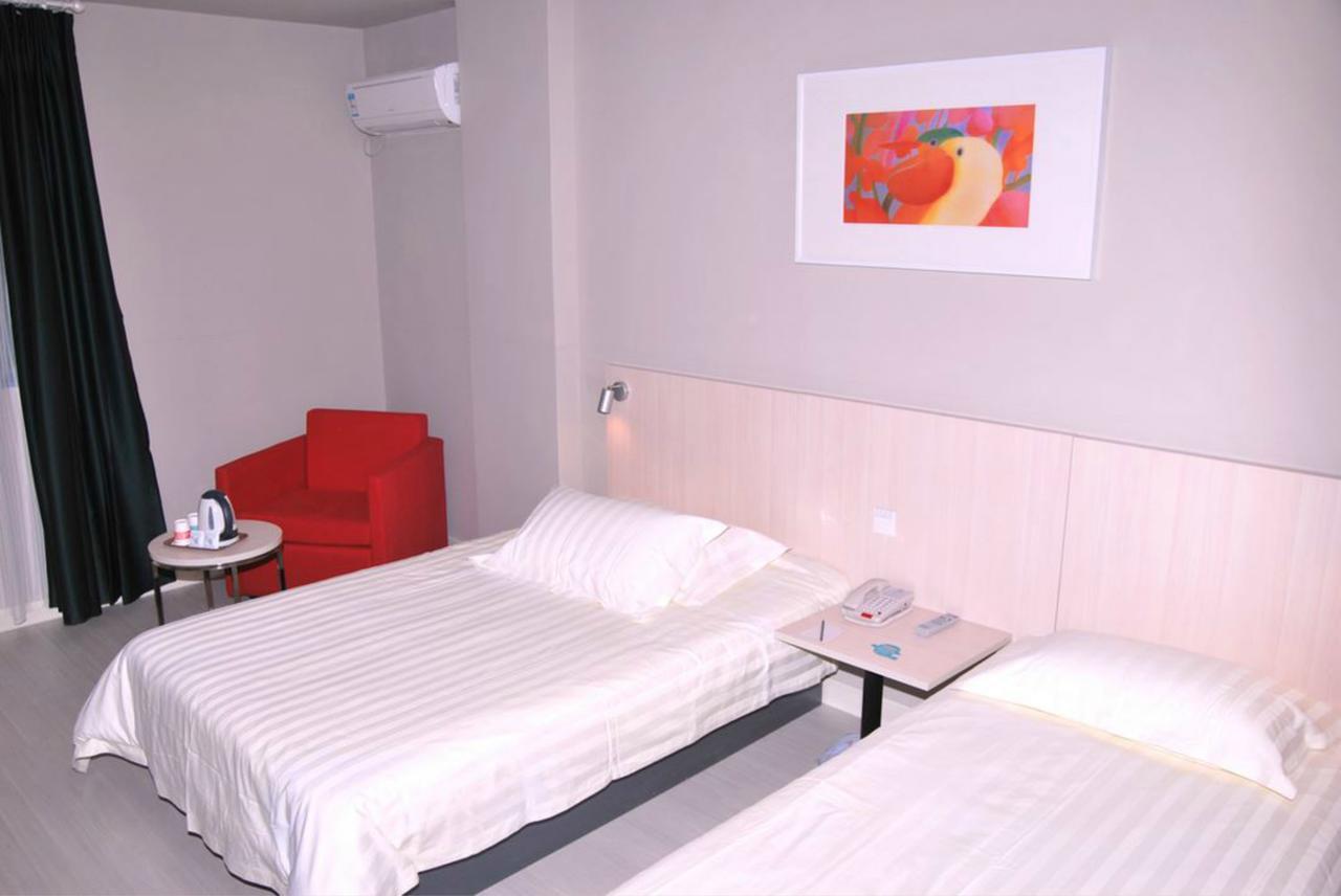 Magnolia Business Hotel Xining Railway Station Grand Cross Mojia Street Bagian luar foto
