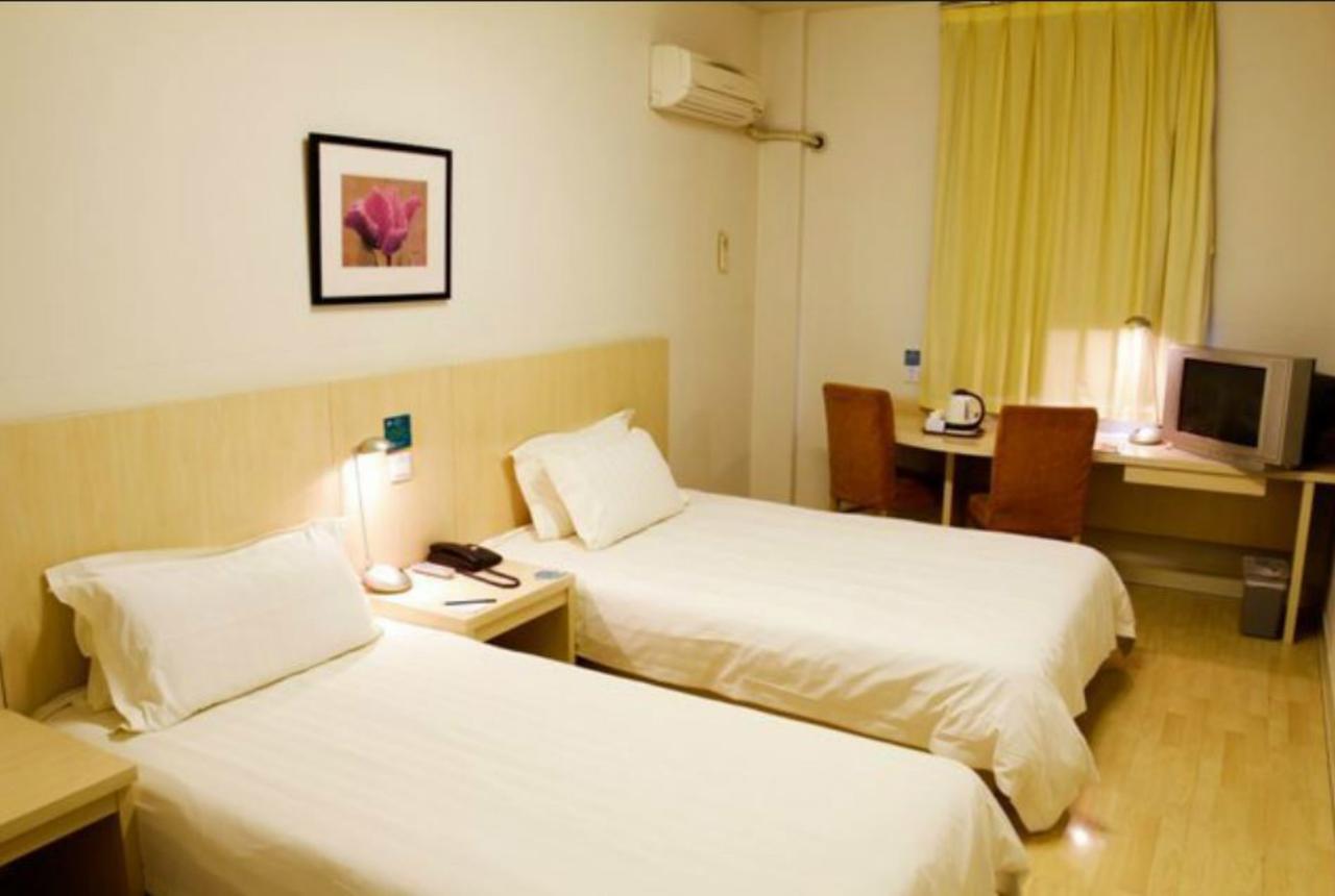 Magnolia Business Hotel Xining Railway Station Grand Cross Mojia Street Bagian luar foto