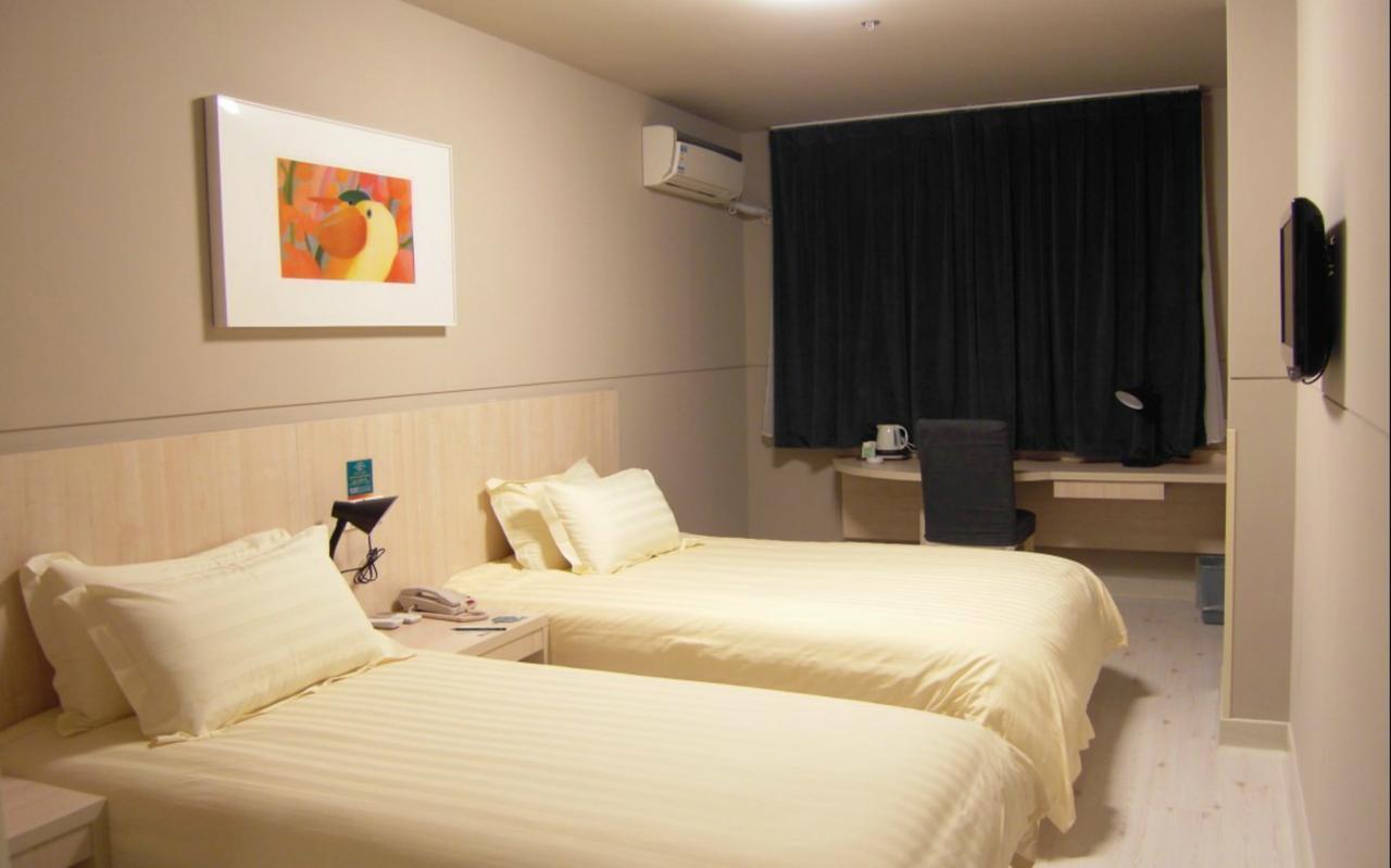 Magnolia Business Hotel Xining Railway Station Grand Cross Mojia Street Bagian luar foto