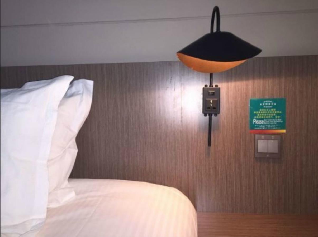 Magnolia Business Hotel Xining Railway Station Grand Cross Mojia Street Bagian luar foto