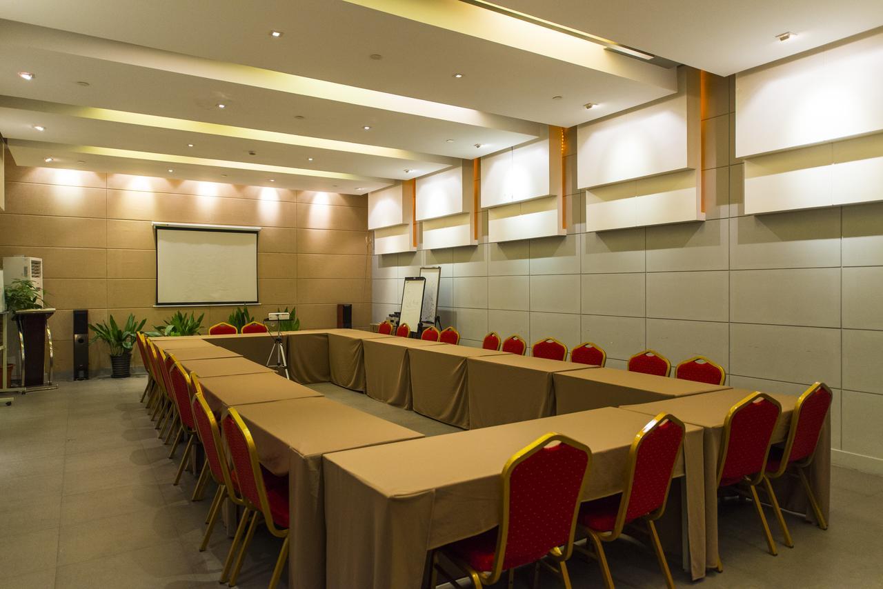 Magnolia Business Hotel Xining Railway Station Grand Cross Mojia Street Bagian luar foto