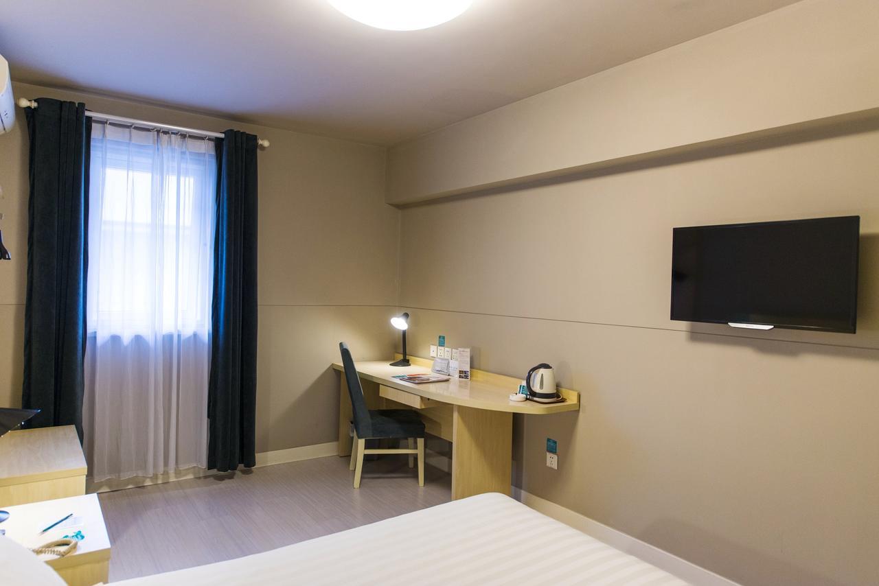 Magnolia Business Hotel Xining Railway Station Grand Cross Mojia Street Bagian luar foto