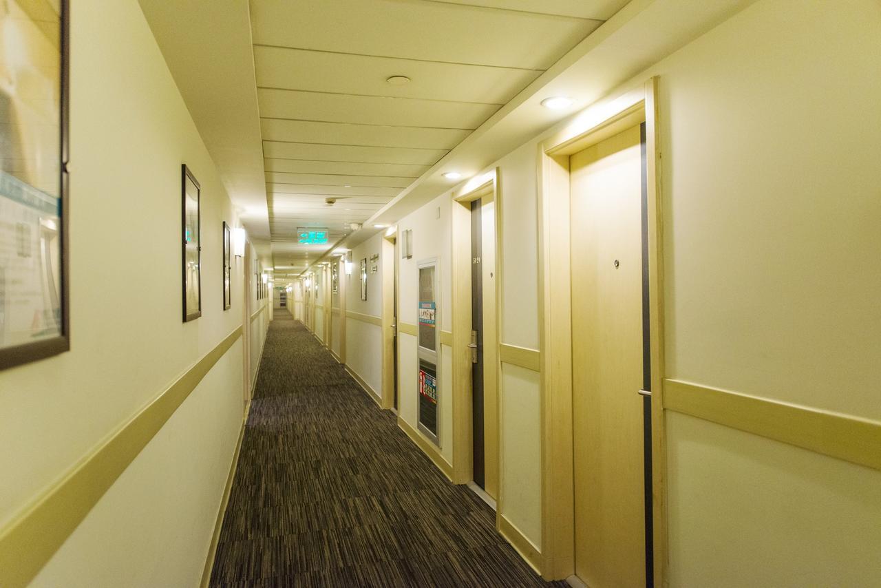 Magnolia Business Hotel Xining Railway Station Grand Cross Mojia Street Bagian luar foto