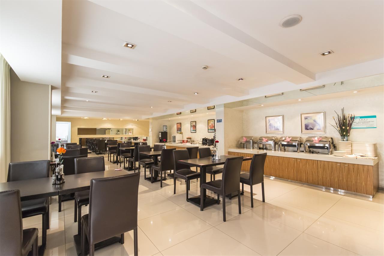 Magnolia Business Hotel Xining Railway Station Grand Cross Mojia Street Bagian luar foto