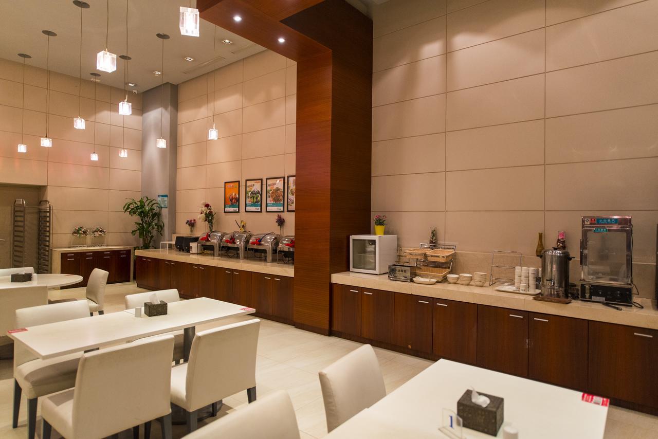 Magnolia Business Hotel Xining Railway Station Grand Cross Mojia Street Bagian luar foto